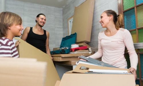 Man with van loading items for a move in Goodmayes