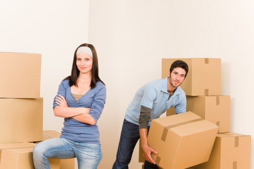 Careful unloading of household items at a Goodmayes property
