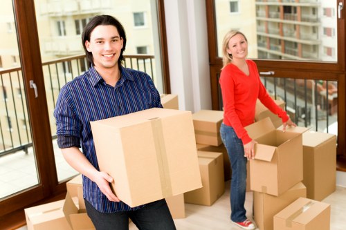 Local moving van helping with furniture transport in Goodmayes