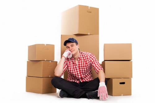 Professional movers assisting with a home move in Goodmayes