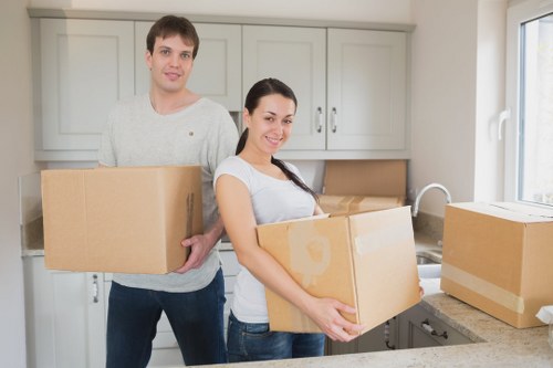 Loading boxes and household items into a van in Goodmayes