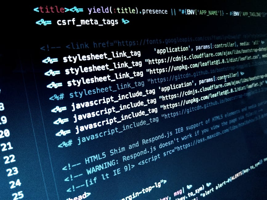Close-up view of a computer screen displaying lines of HTML and JavaScript code in a text editor, illuminated by a blue glow. The code includes stylesheet links, script includes, comments, and warnings related to HTML5 Shim and Respond.js compatibility for IE8 support. The background shows a dark interface with line numbers on the left, indicating active coding activity. This coding environment may be used by IT professionals or web developers involved in website maintenance or renovation, analogous to the logistics process during a home relocation project managed by a removals company like manwithvangoodmayes.co.uk, focusing on meticulous planning and technical execution.